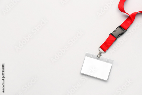 Blank badge with red lanyar...