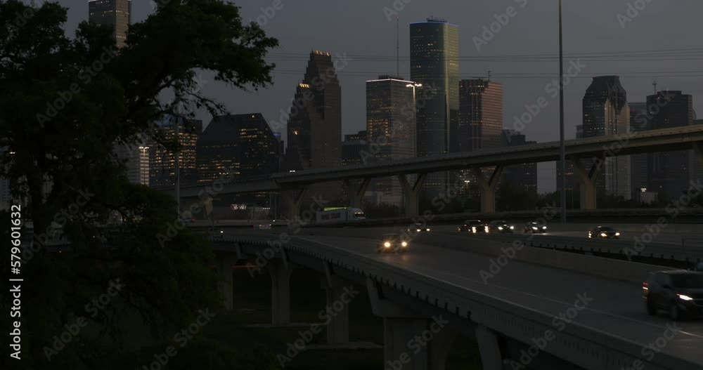 Establishing shot of cars on I-45 North with downtown Houston in the background Establishing shot of cars on I-45 North with downtown Houston in the background