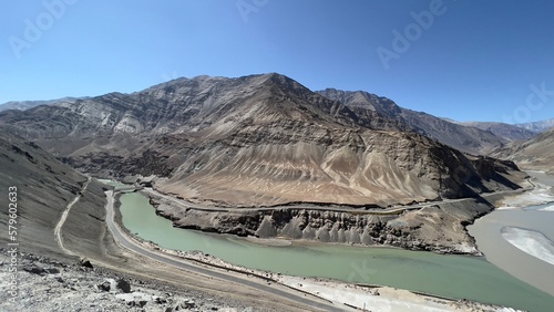 Sangam, Confluence of Zanskar and Indus river near Leh Ladakh, India shows its 2 color during summer time