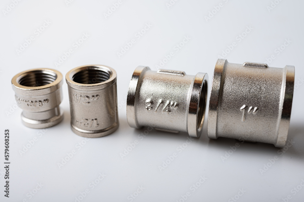 brass metal tee water adapters isolated on light background close up plumbing connections and details brass metal tee water adapters isolated on light background close up plumbing connections and details