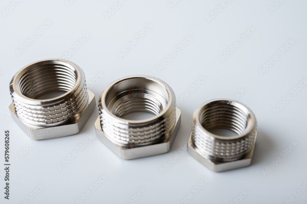 brass metal tee water adapters isolated on light background close up plumbing connections and details brass metal tee water adapters isolated on light background close up plumbing connections and details