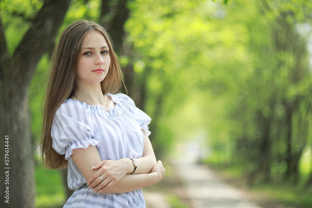 A girl in a spring green park A girl in a spring green park