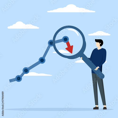 Stock market decline or Cryptocurrency, businessman with magnifying glass on arrow refuses. economic downturn or recession, falling market signals, inflation or falling interest rates concept.