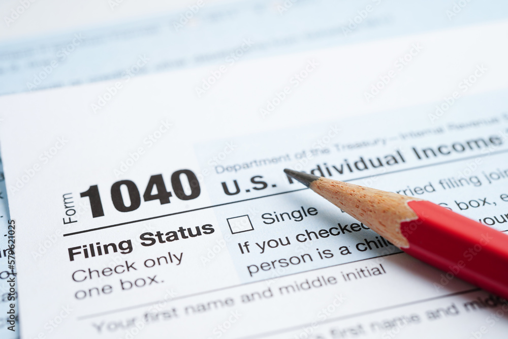 Tax form 1040 U.S. Individual Income Tax Return, business finance concept. Tax form 1040 U.S. Individual Income Tax Return, business finance concept.