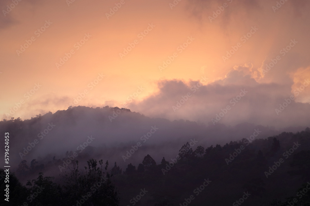 mist covered mountain at sunrise mist covered mountain at sunrise