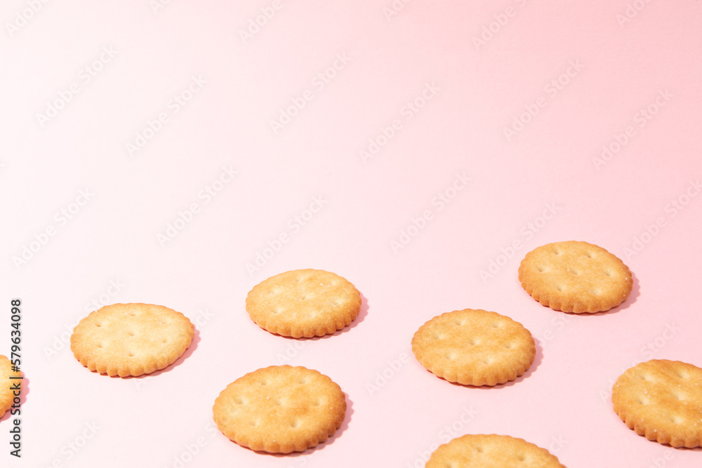 Biscuits on a pink background