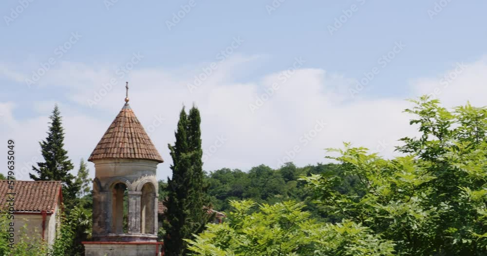 Motsameta monastery church steeples with crosses above trees, Georgia. Motsameta monastery church steeples with crosses above trees, Georgia.