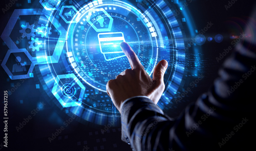 Concept of digital economy, e-payment, and online banking. Young businessman select the icon E- banking on the virtual display. Concept of digital economy, e-payment, and online banking. Young businessman select the icon E- banking on the virtual display.
