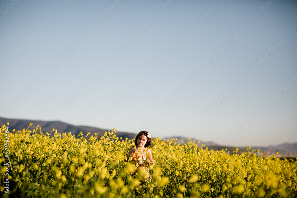 Seven Year Old Girl Picking Wildflowers in San Diego Seven Year Old Girl Picking Wildflowers in San Diego