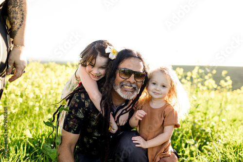 Nieces & Uncles in Flower Field in San Diego photo