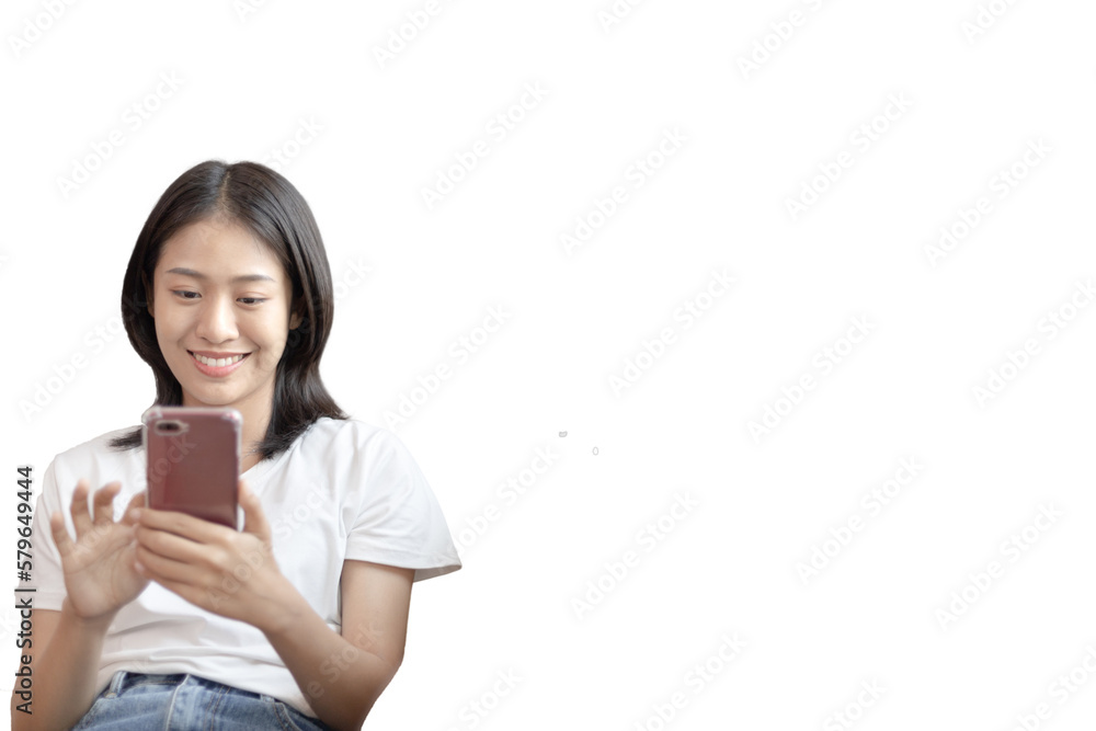 Asian woman sitting with smart phone on sofa in living room, Looking at tablet screen, Relaxing at home, Working through the Internet communication system, Happy working lifestyle. Asian woman sitting with smart phone on sofa in living room, Looking at tablet screen, Relaxing at home, Working through the Internet communication system, Happy working lifestyle.