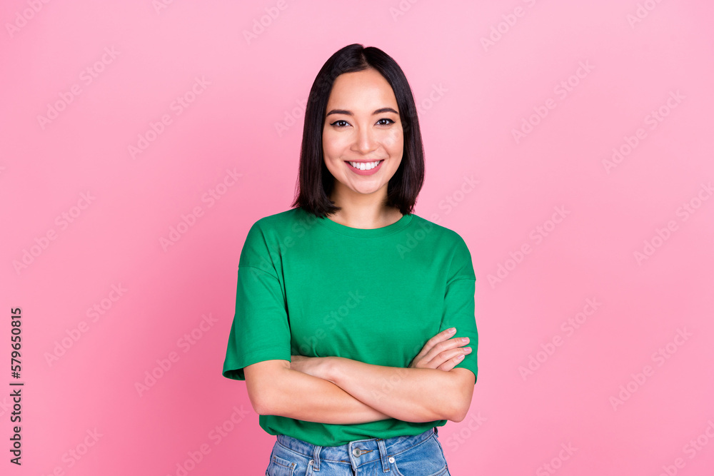 Photo portrait of young smiling optimistic charming korean business lady folded arms enjoy her stylish outfit isolated on pink color background Photo portrait of young smiling optimistic charming korean business lady folded arms enjoy her stylish outfit isolated on pink color background