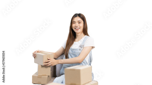 Small business owners or SMEs doing business related to selling and shipping online, New business style for young people working at home and owning businesses, Packing box, Sell online concept. © Puwasit Inyavileart
