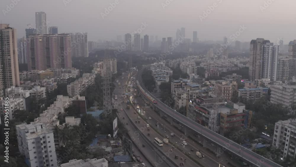 Aerial View Of Traffic And Mumbai Skyline In Smog During Rush Hour In India. Aerial View Of Traffic And Mumbai Skyline In Smog During Rush Hour In India.