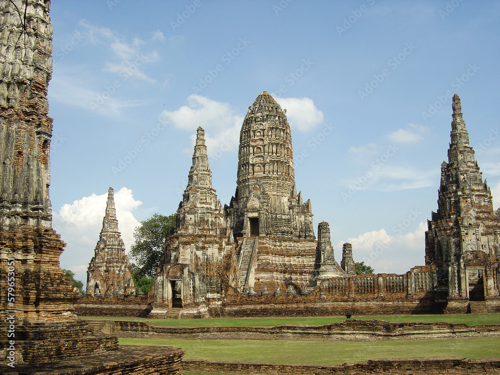 Beautiful historic Buddhist temple landscape with stone towers and copy space in old Ayutthaya - Thailand Beautiful historic Buddhist temple landscape with stone towers and copy space in old Ayutthaya - Thailand
