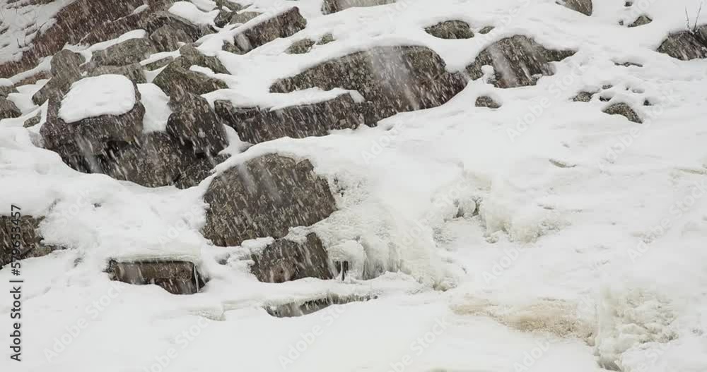 Rocks covered with snow in winter. Rocks covered with snow in winter.