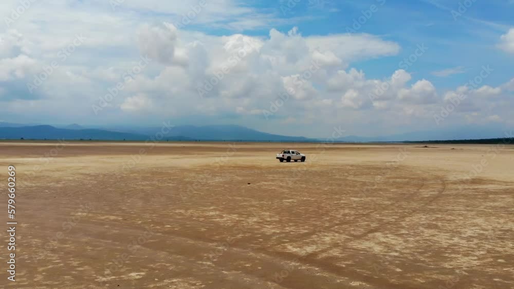 Off road pickup truck in the desert, Drone shot Off road pickup truck in the desert, Drone shot