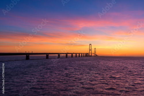 The Great Belt bridge in Denmark during a very colorful sunset © Niels Melander
