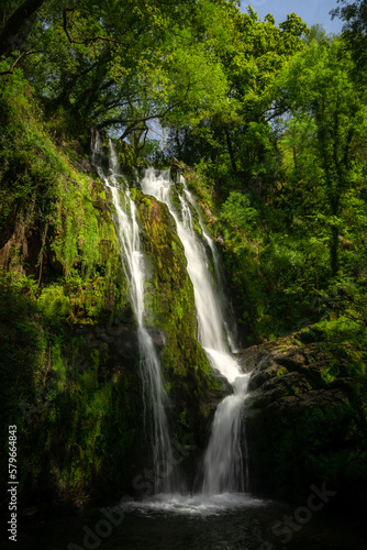Fototapeta Naklejka Na Ścianę i Meble -  Oneta waterfalls natural monument on springtime in Asturias, Spain