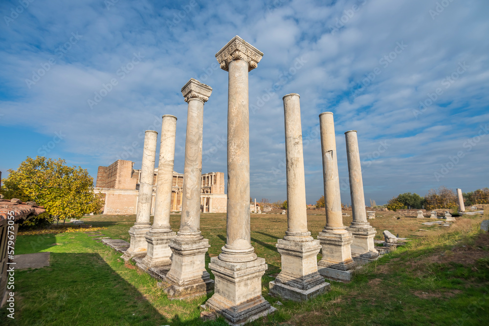 Sardes ancient city ruins with different angles on a sunny day with beautiful blue sky and clouds