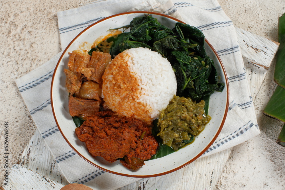 Nasi Padang with rendang is an Indonesian food from West Sumatra in