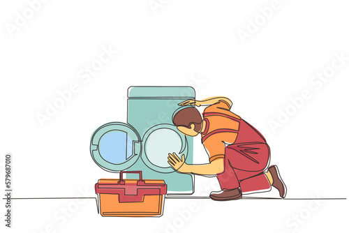 Single continuous line drawing professional repairman fixing washing machine at home. Plumbing specialist with toolbox fixing, repairing washer, washing machine. One line draw graphic design vector