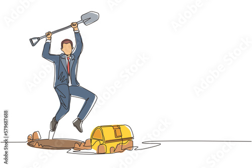 Single continuous line drawing businessman in hole prancing happily while lifting shovel with both hands and finding treasure chest. Lucky rich man. Dynamic one line graphic design vector illustration