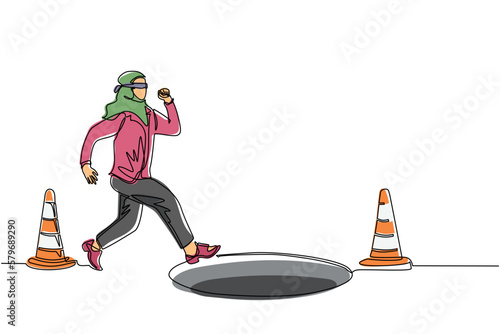 Single one line drawing blindfolded Arab businesswoman running to find money with pit hole. Woman runs to business trap. Blind investment concept. Metaphor. Continuous line draw design graphic vector