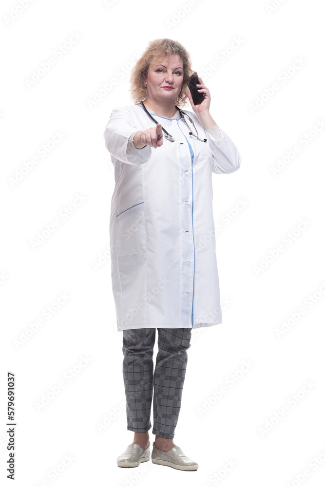 senior female doctor talking on her smartphone. senior female doctor talking on her smartphone.