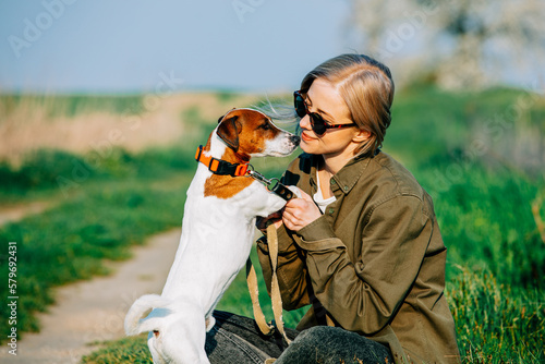 Εκτύπωση καμβά Blonde with jack russell terrier dog on country road