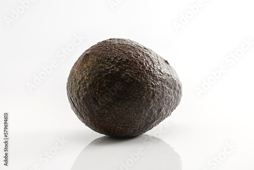 Close-up  whole avocado on a white background