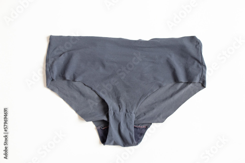 Women's old panties on a white background, close-up underwear