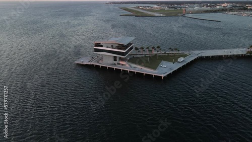 The St. Petersburg Pier, officially known as the St. Pete Pier during sunrise.	
