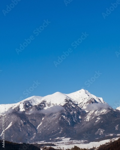 snow covered mountains with blue sky © Danijel