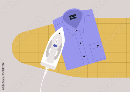 A folded shirt and an iron on an ironing board, household chores, daily routine