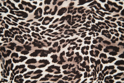 Leopard effect  fabric pattern. Background sample  seamless background print texture. Animal textil design.