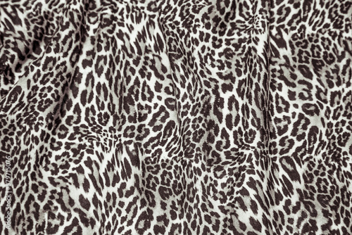 Leopard effect  fabric pattern. Background sample  seamless background print texture. Animal textil design.