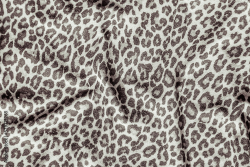 Leopard effect, fabric pattern. Background sample, seamless background print texture. Animal textil design.