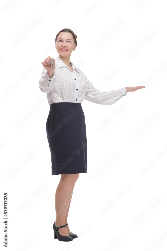 in full growth.business woman with keys in hand. in full growth.business woman with keys in hand.