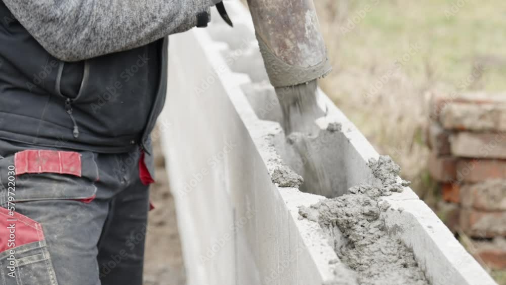 concreting the foundation of the house from the lost formwork, construction of a family house concreting the foundation of the house from the lost formwork, construction of a family house