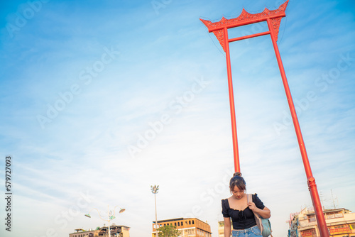 Beautiful asian woman travel at giant swing temple street photo