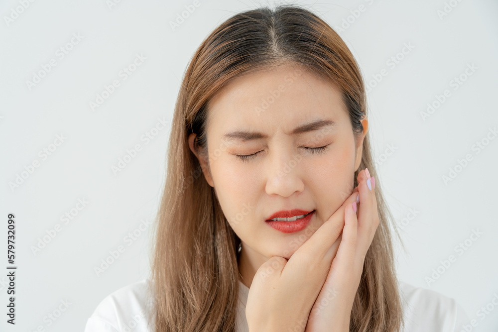 Asian woman feel toothache from gingivitis, female suffer tooth, decay problems, dental care. sensitive tooth, decay problem, bad breath, Gingival Recession, Oral Hygiene instruction, tooth extraction Asian woman feel toothache from gingivitis, female suffer tooth, decay problems, dental care. sensitive tooth, decay problem, bad breath, Gingival Recession, Oral Hygiene instruction, tooth extraction