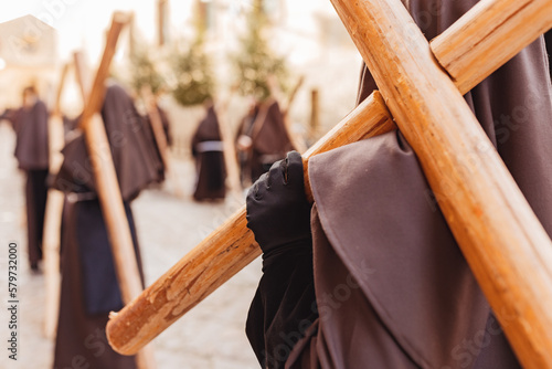 Photos Penitents by day carrying a cross on their shoulders