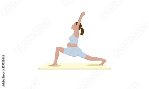Pregnant woman in blue activewear clothes standing in a pose and doing yoga