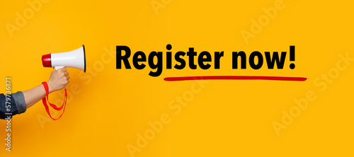 Hand with a megaphone and a register now text	
