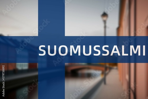 Suomussalmi: Ortsname der finischen Stadt Suomussalmi in der Region Kainuu auf der finnischen Flagge photo