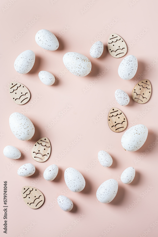 Happy Easter greeting card with eggs on pink background Happy Easter greeting card with eggs on pink background