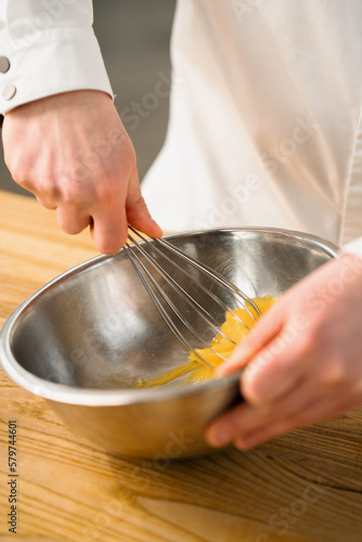 Professional kitchen chef prepares pancakes kitchen utensils