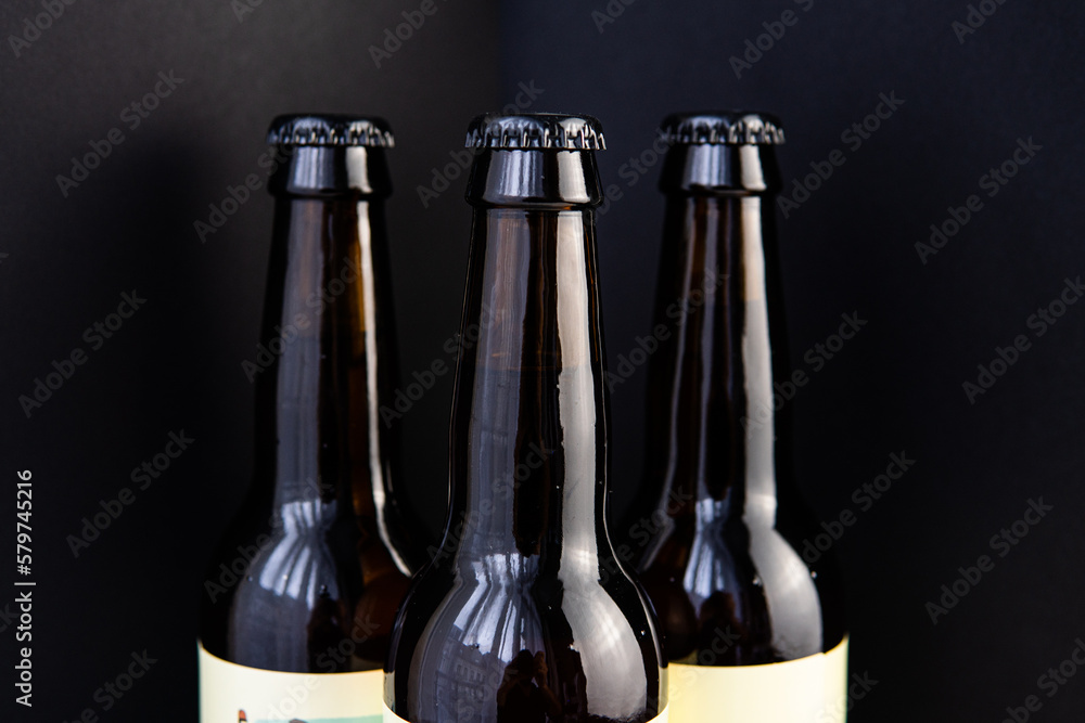 closed bottles with black beer