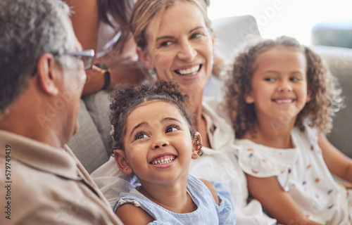 Happy, smile and family relax on living room couch and talking, conversation and doing a catch up. Love, diverse grandparents and grandchildren bonding, fun and quality time in family home together.